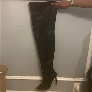 Long thigh high boots heels
